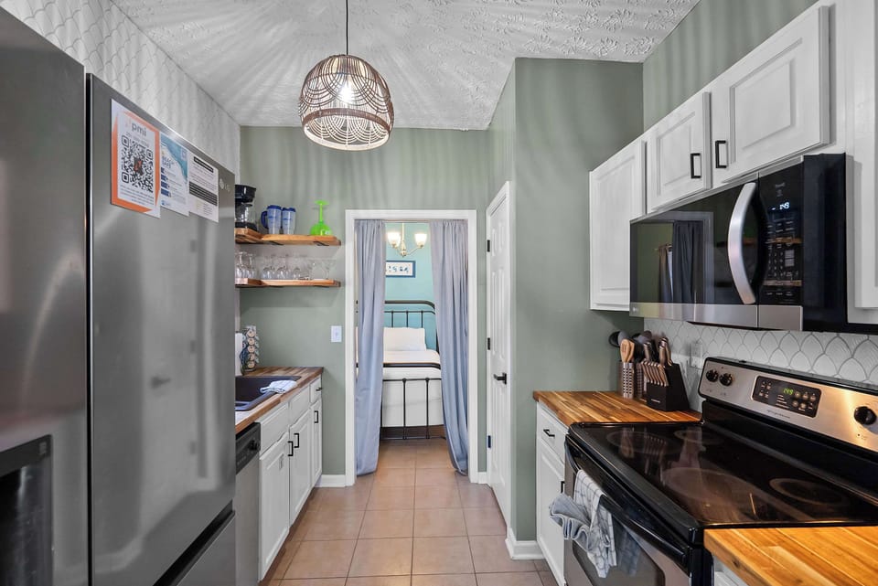 Fully equipped kitchen with stainless appliances and plenty of cabinet space