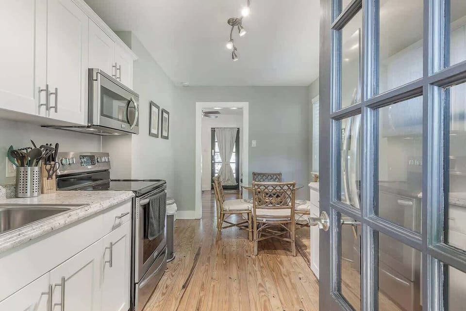 Charming Kitchen: Bright space with modern appliances and a delightful dining area for memorable meals!