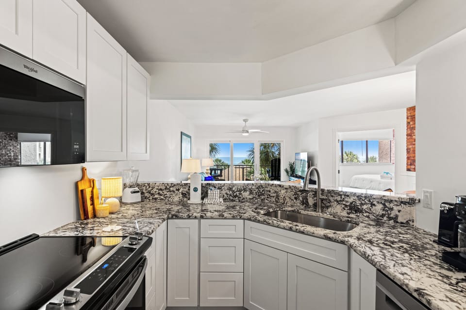 Condo, Multiple Beds, Ocean View (The Summerhouse 203A) | Private kitchen