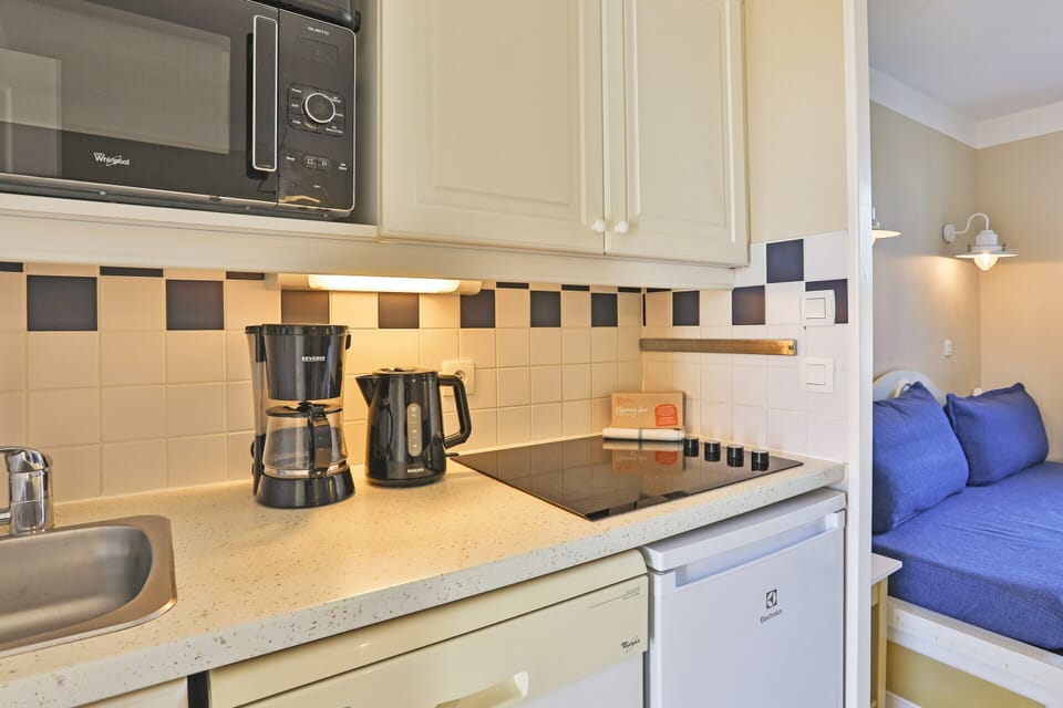 Apartment | Private kitchen | Cleaning supplies