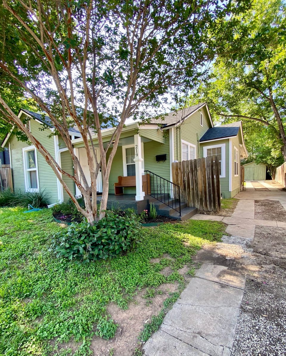 Spacious front exterior with easy self check-in and convenient parking.