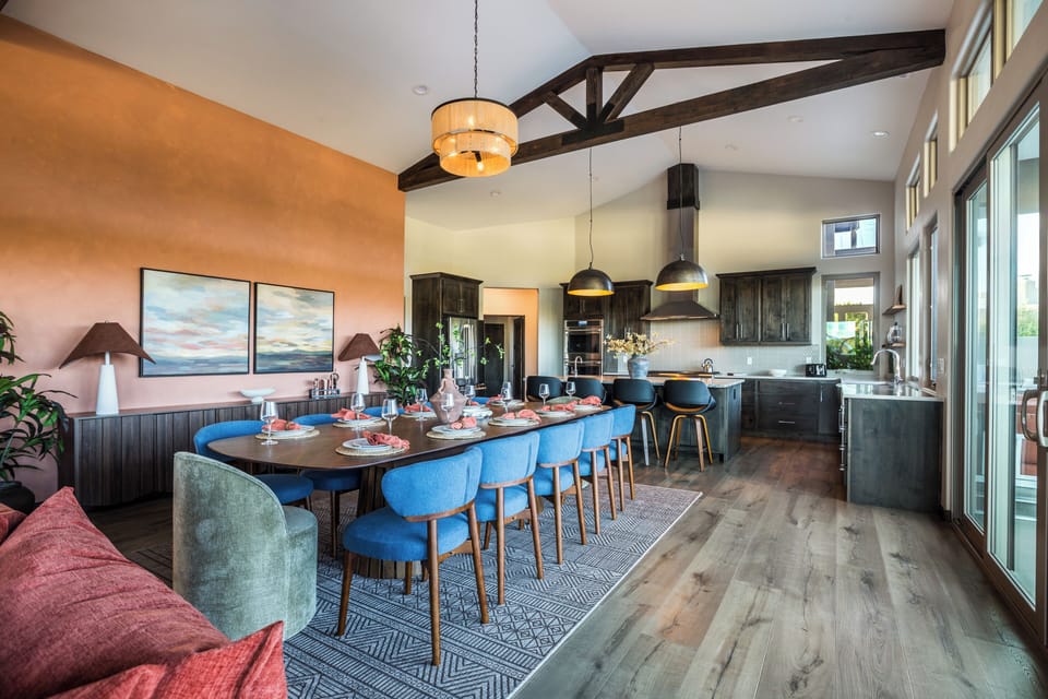 Bright, High Ceilings and Colorful seating create the Perfect Family Dinner Vibe