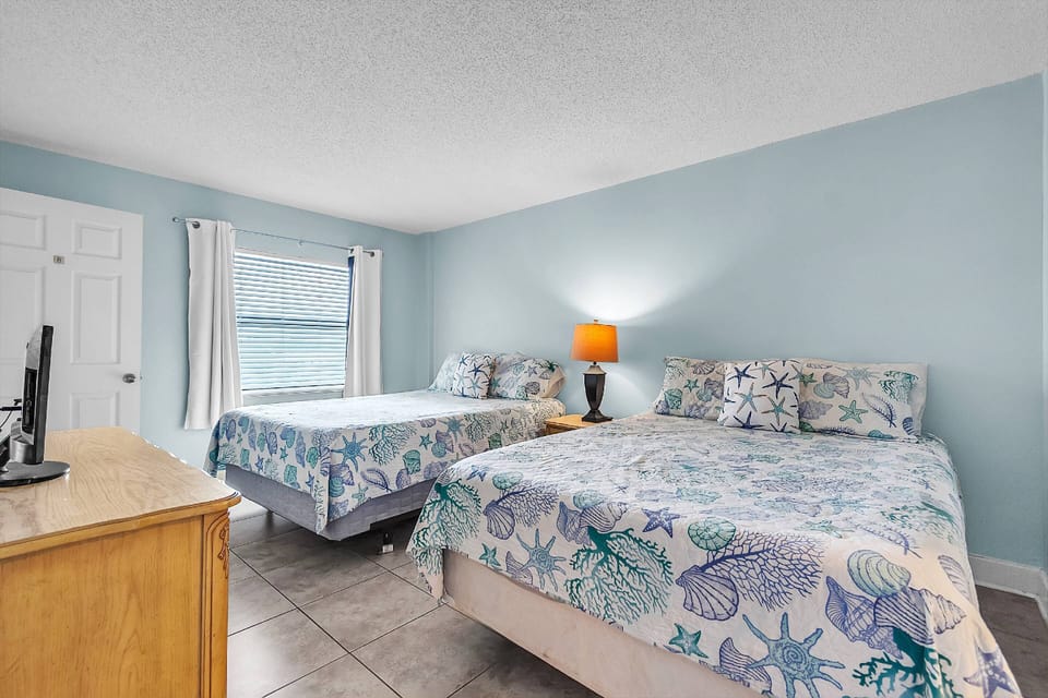 Guest Bedroom with Queen Size Bed and Smart TV