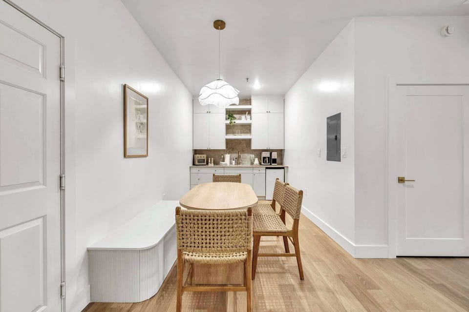 Dining table and stocked kitchenette