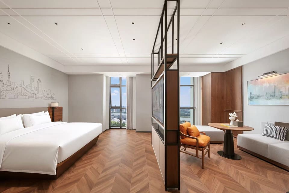 Basic Triple Room | Minibar (free items), in-room safe, blackout drapes