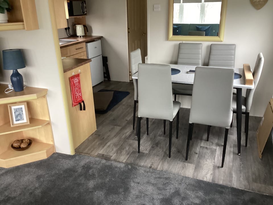 Open and spacious dining area that comfortably seats six.