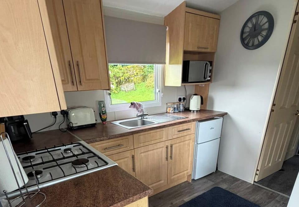 Bright and spacious kitchen, fully equipped to meet all your needs.