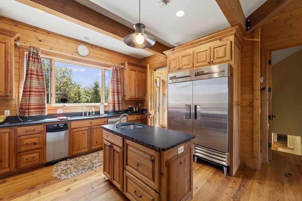 Fully equipped kitchen with spacious commercial fridge