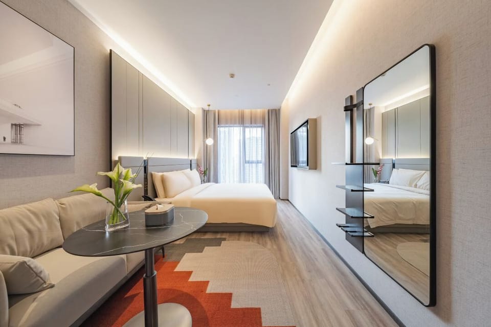 Premium bedding, down comforters, pillowtop beds, free minibar