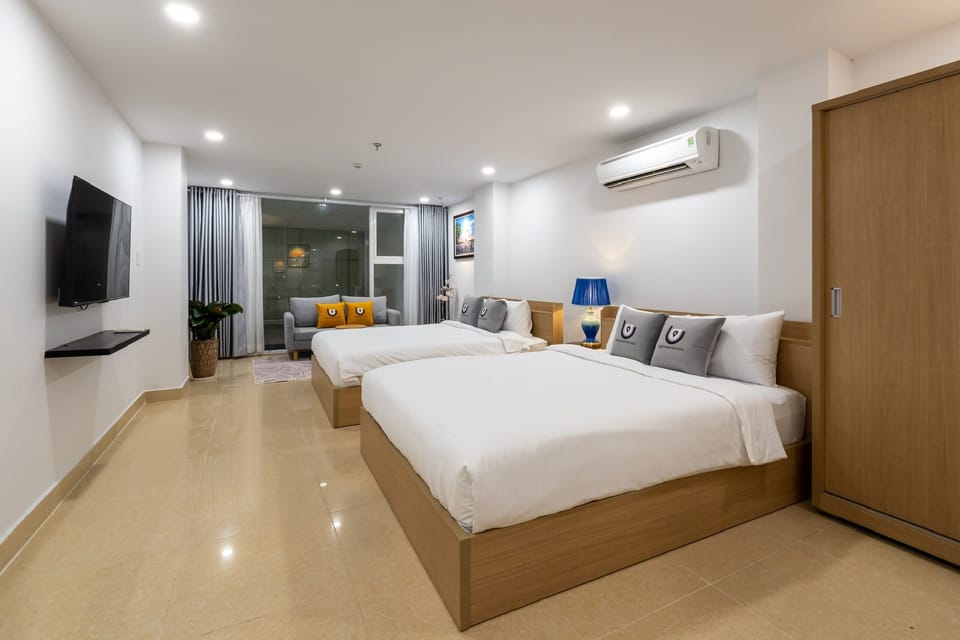 Standard Quadruple Room, City View | Soundproofing, iron/ironing board, free WiFi