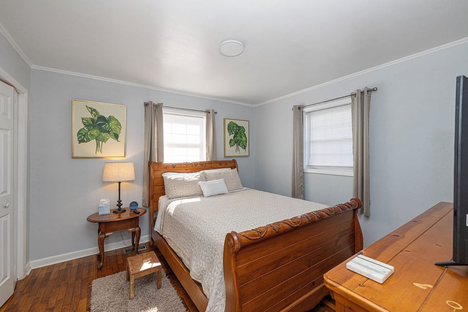 Queen sleigh bed, Amazon Alexa, hardwood floors, full dresser, double door closet, TV and smoke detector/alarm, USB A & C charger outlet.
