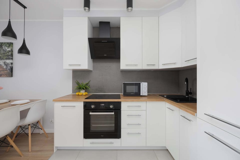 Cook and dine in style with the modern kitchenette and dining area.