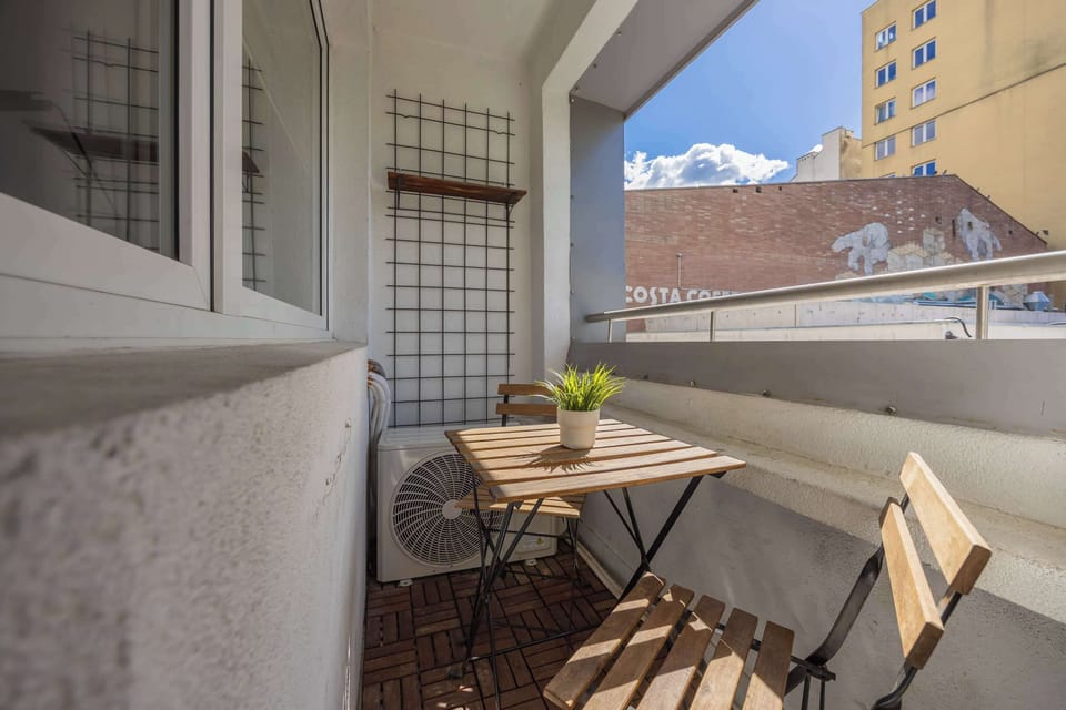 The balcony provides a perfect spot for enjoying the fresh air.