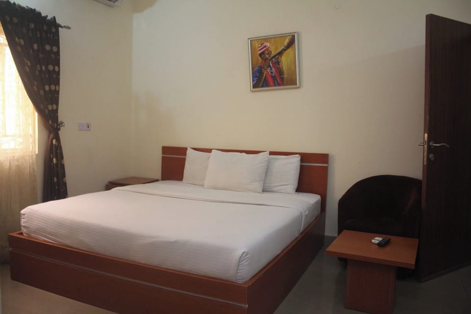 Deluxe Room, Balcony, City View | Desk, laptop workspace, blackout drapes, soundproofing