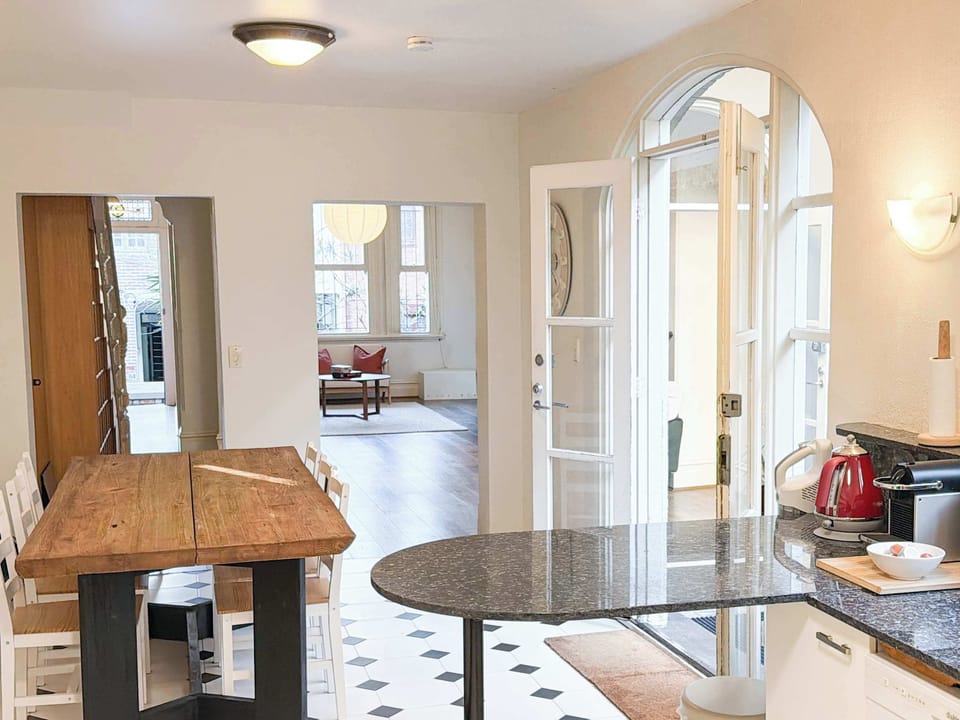 Tea/Coffee station and a large dining table to bring the house together
