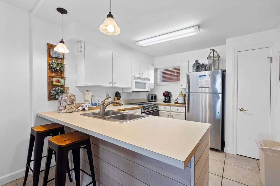 Exclusive Condo, Beach View | Private kitchen | Coffee/tea maker, fridge, microwave, oven