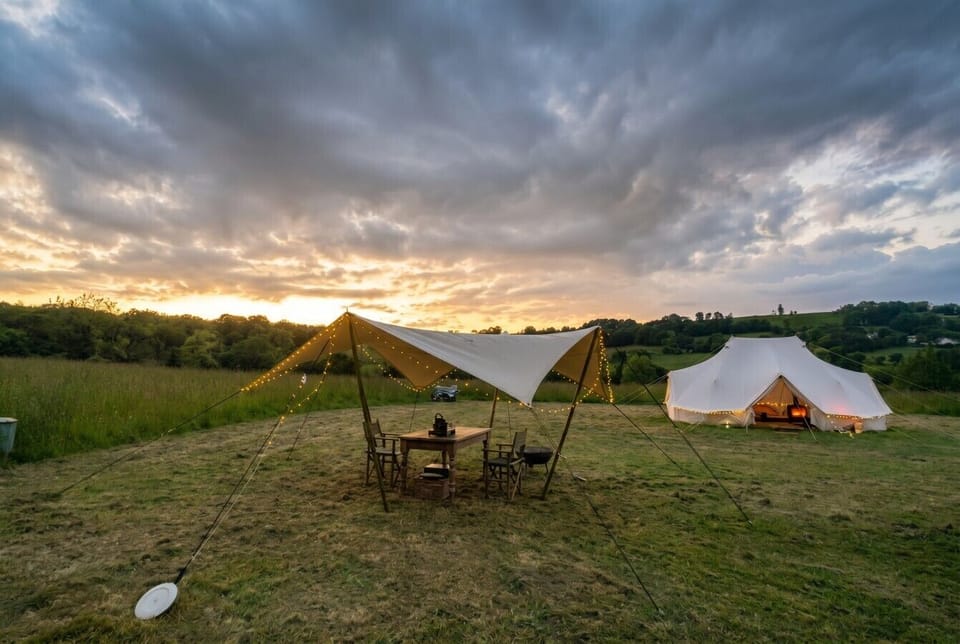 Golden sunset over your private pitch and sheltered outdoor dining spot