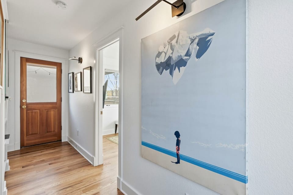 Door to the upstairs bedroom and balcony