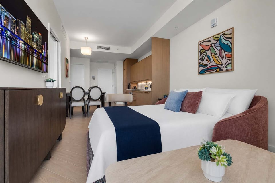 Relax in our chic, multi-functional space! Featuring a plush full-size sofa bed, perfect for extra guests. Enjoy bright natural light, stylish decor, and direct access to your private balcony with vibrant Wynwood views.