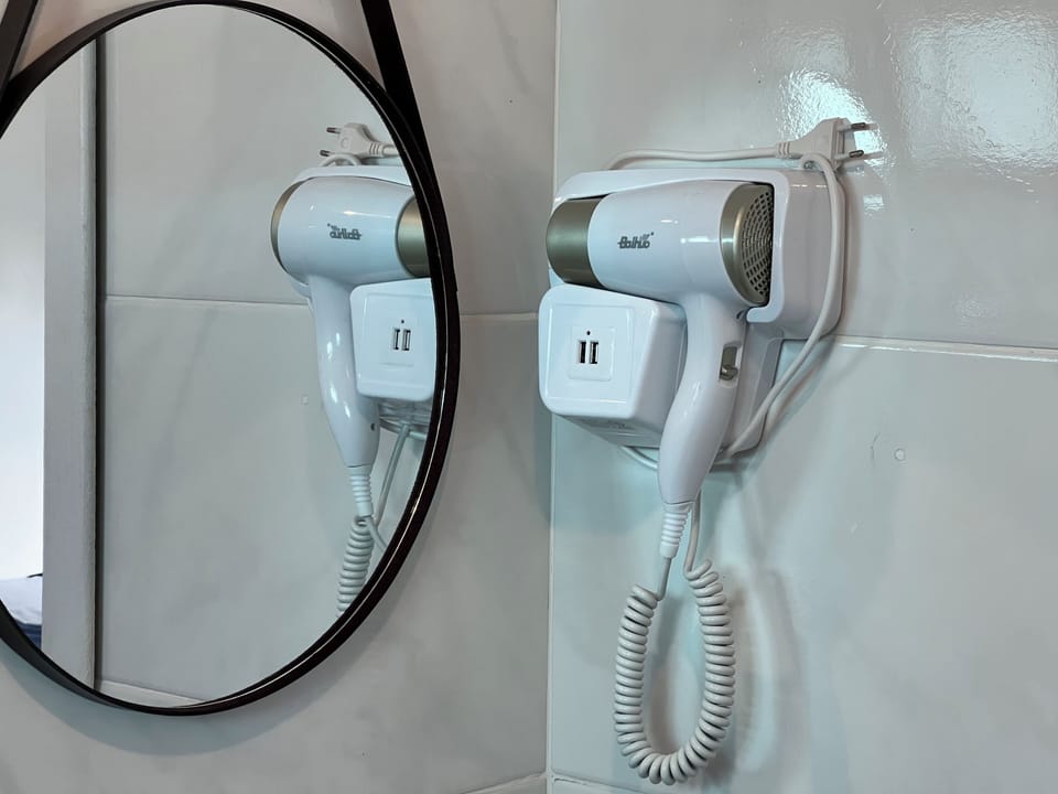 Family House, Air conditioning, Courtyard View | Bathroom | Hair dryer, towels, soap, toilet paper
