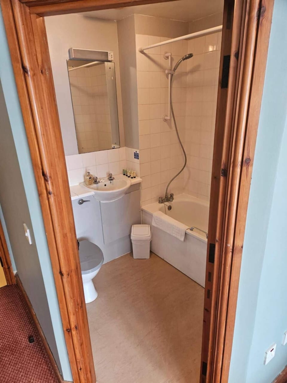 Combined shower/tub, hair dryer, towels, soap