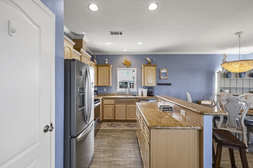 Cook, connect, and create memories in this open-concept kitchen