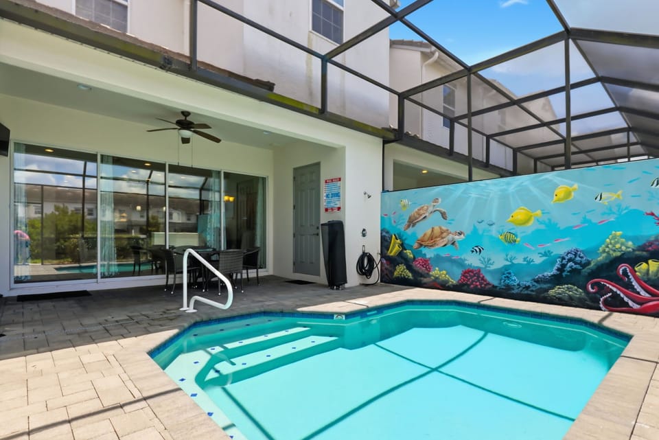 Enjoy your private splash pool with peaceful natural views just beyond the screened lanai.