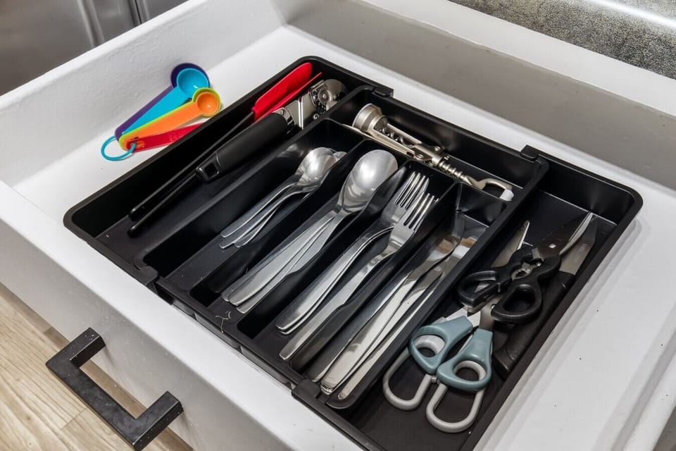 Fully equipped kitchen with modern appliances, perfect for preparing meals during your stay in Arlington. A convenient option for longer stays, game weekends, or concert trips near AT&T Stadium