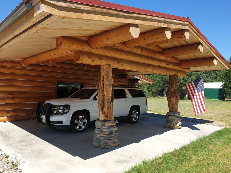Carport with entry door