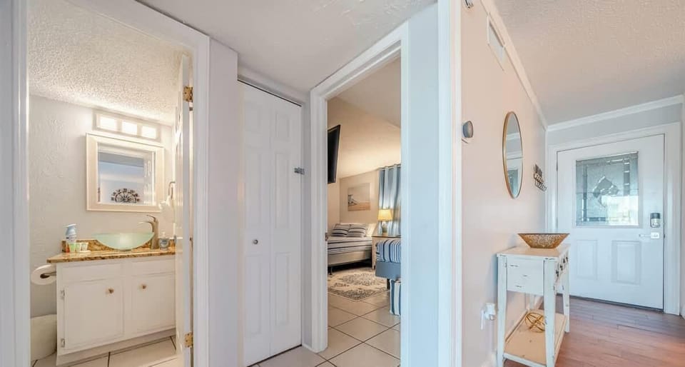Second bathroom entrance and hallway