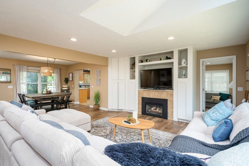 Living room area with fireplace and TV
