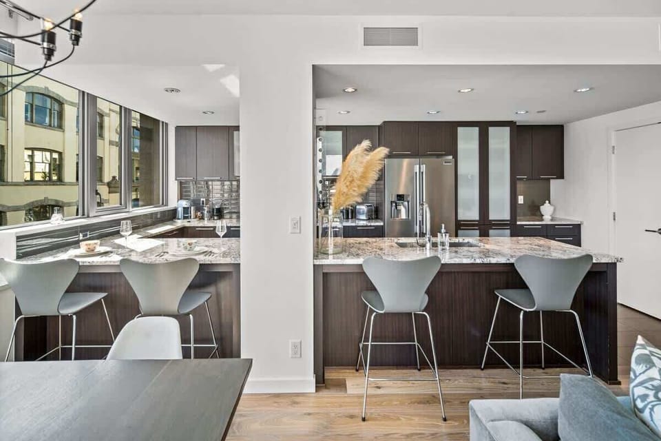 Kitchen with breakfast bar and/or work space.
