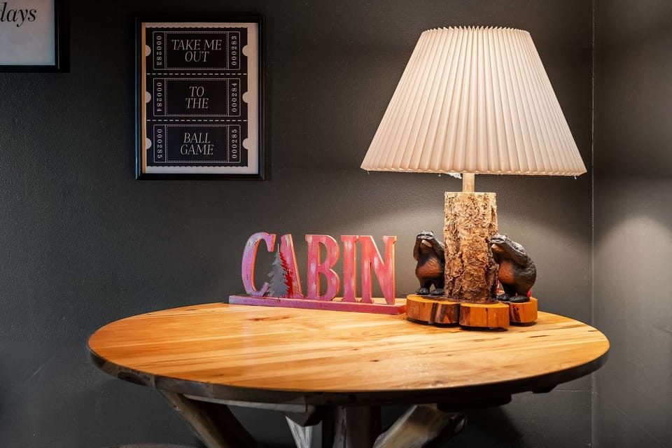 Every corner has a cabin-y touch, from bear decor to the 'take me out to the ball game' charm.
