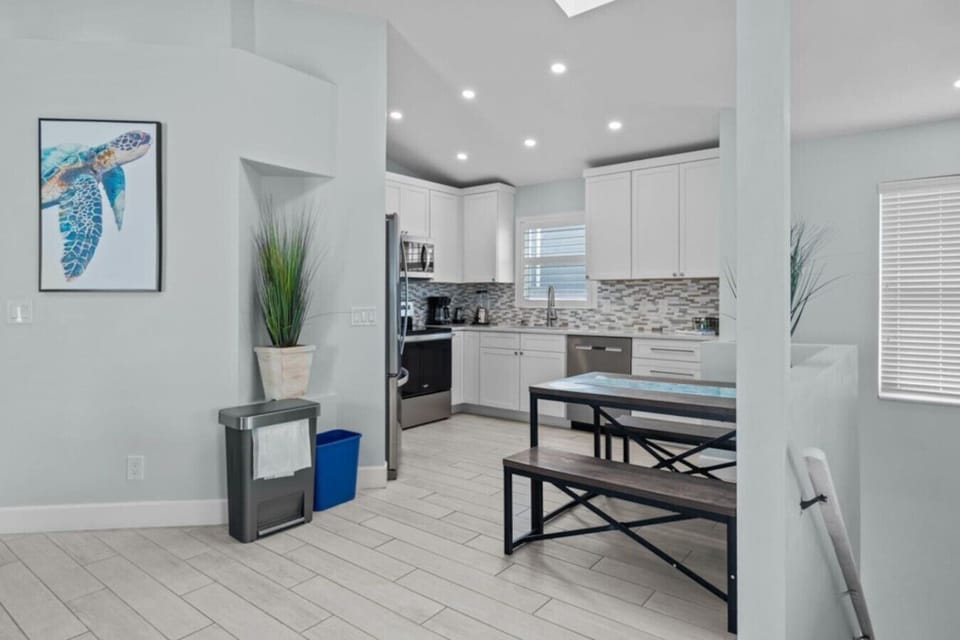 Gather, dine, and make memories in this open-concept fully equipped kitchen.