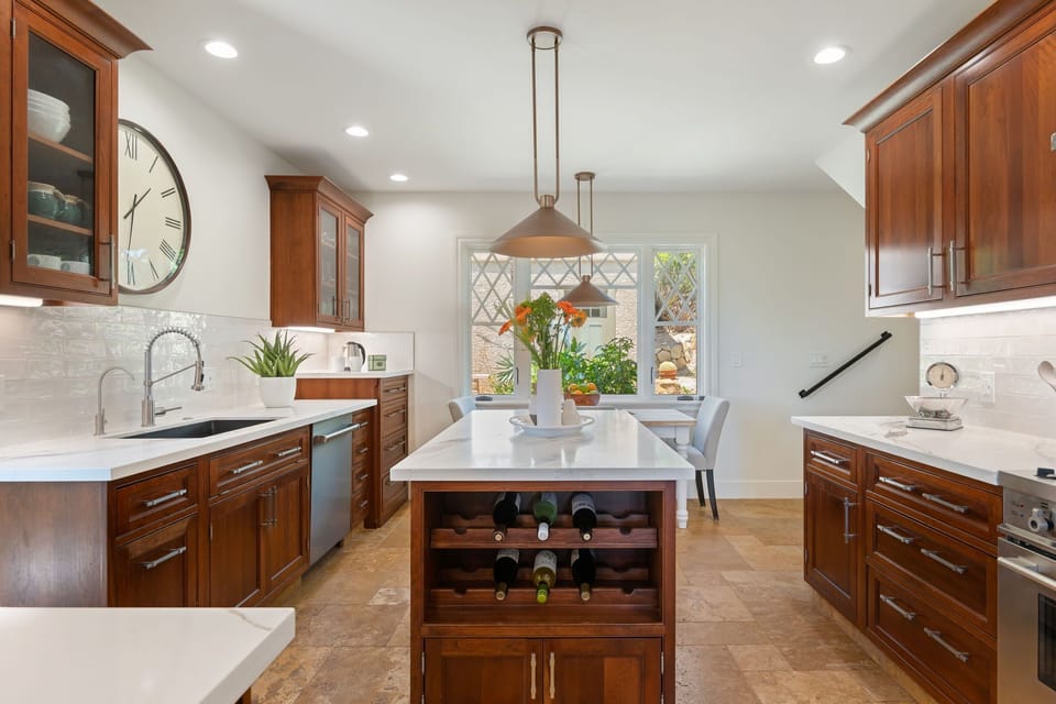 Gorgeous remodeled kitchen with breakfast table and island