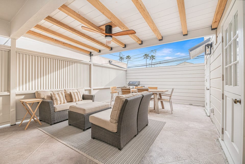 Step out onto the upper deck for seamless access to the second guest bedroom and versatile bonus room
                