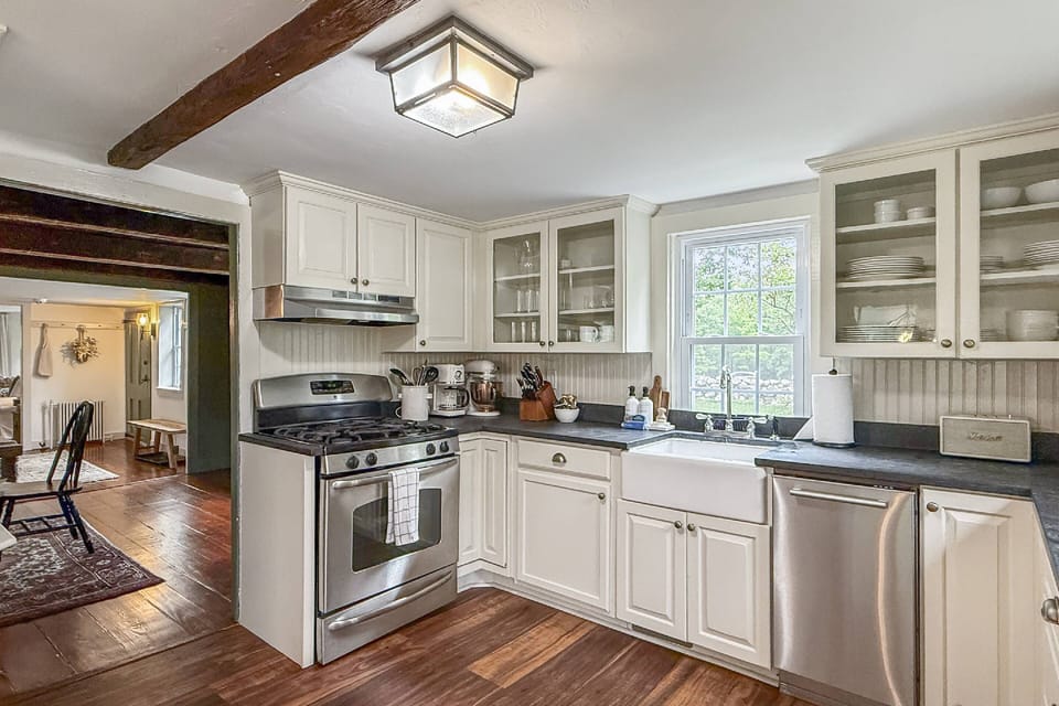 Cozy kitchen with modern appliances.