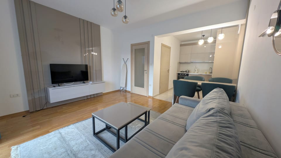Comfort Apartment, Balcony, Sea View | Living area | Flat-screen TV