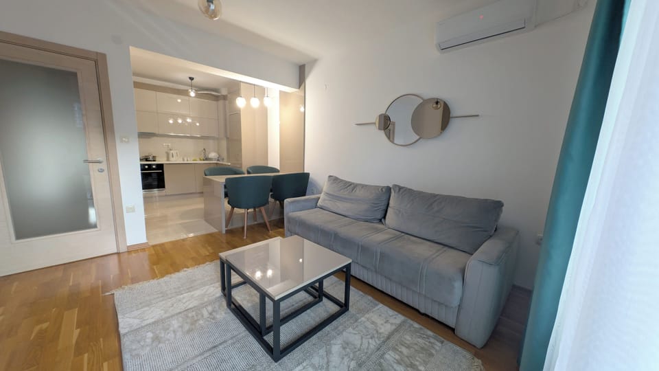 Comfort Apartment, Balcony, Sea View | Living area | Flat-screen TV