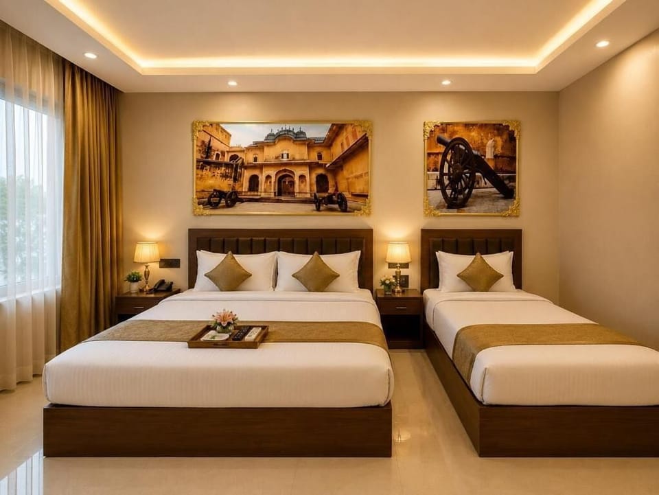 Family Double Room, Garden View | Minibar, in-room safe, desk, laptop workspace