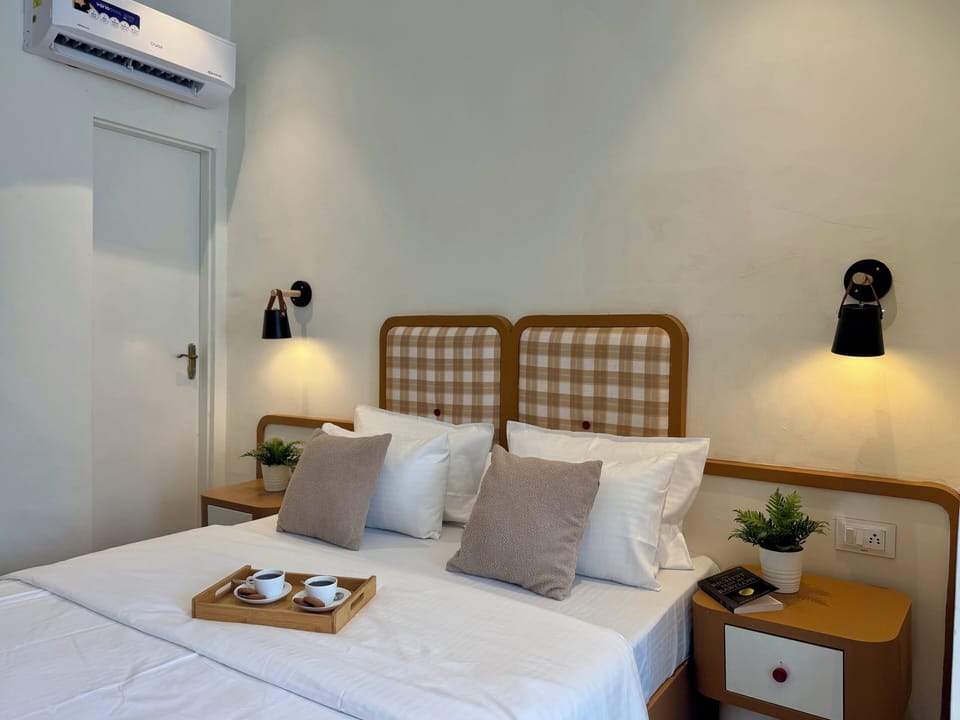 Deluxe Room, City View | Individually decorated, individually furnished, desk, laptop workspace