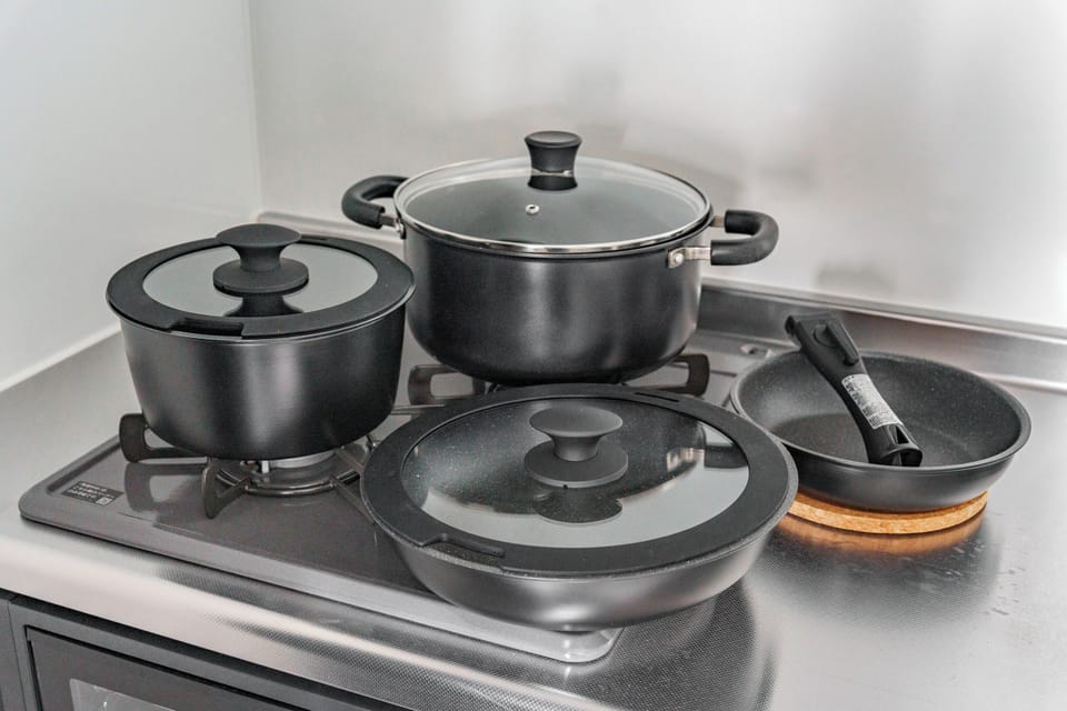 Apartment | Private kitchen | Fridge, microwave, stovetop, cookware/dishes/utensils