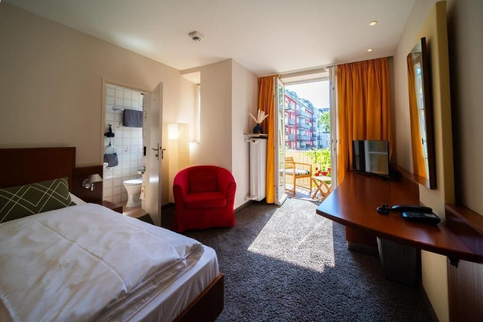 Superior Single Room, Balcony, City View | Hypo-allergenic bedding available, desk, laptop workspace