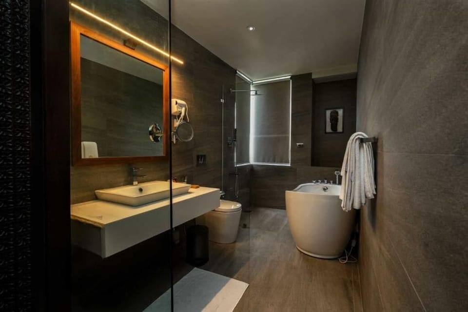 Deluxe Double Room, Balcony, Mountain View | Bathroom | Free toiletries, hair dryer, bidet, towels