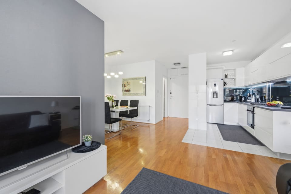 Apartment, Balcony, City View | Living area | Flat-screen TV