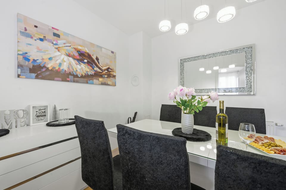 Apartment, Balcony, City View | Living area | Flat-screen TV