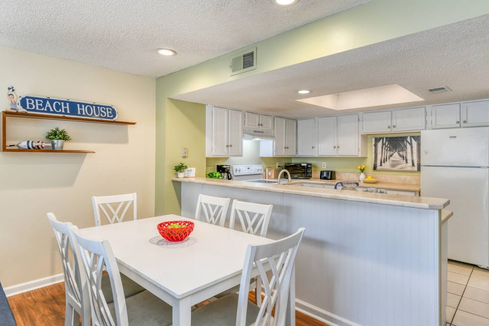 Enjoy delicious meals and great conversation at the dining table with seating for six.