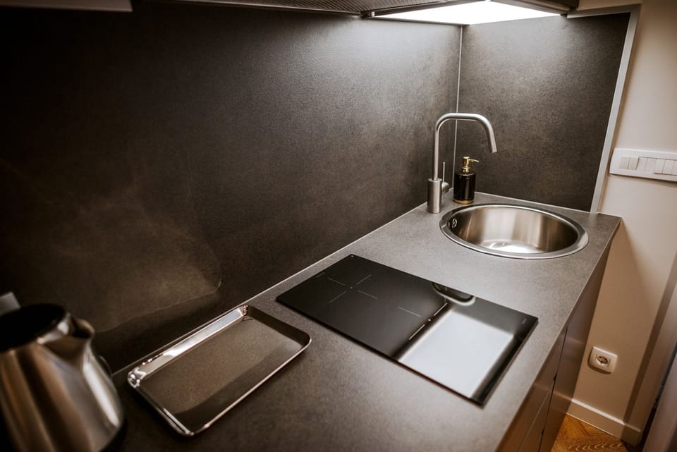 Junior Suite with Balcony | Private kitchen | Fridge, microwave, espresso maker, coffee/tea maker