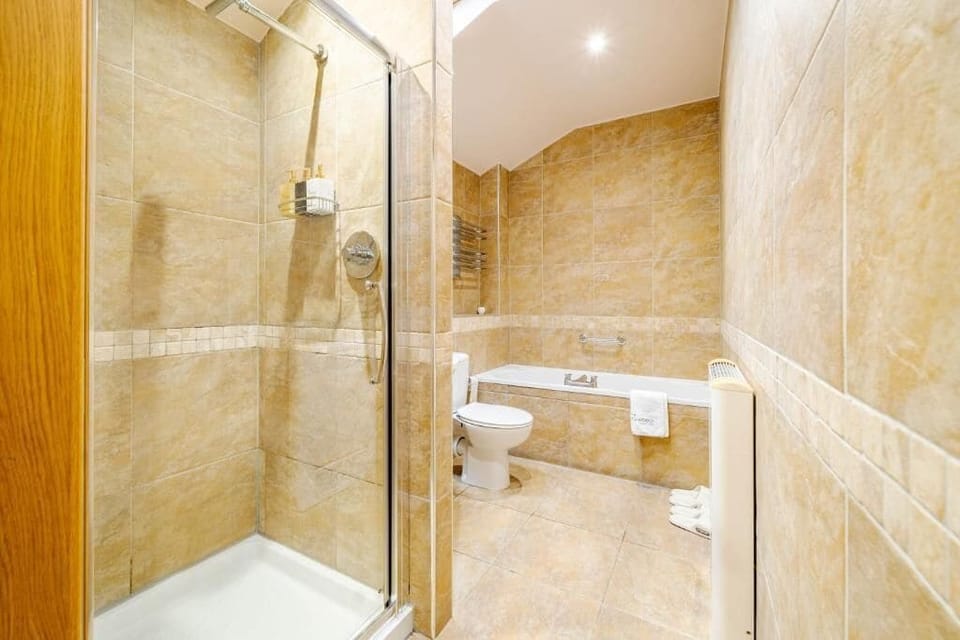 Family Room, Patio, Garden View | Bathroom | Separate tub and shower, deep soaking tub, rainfall showerhead