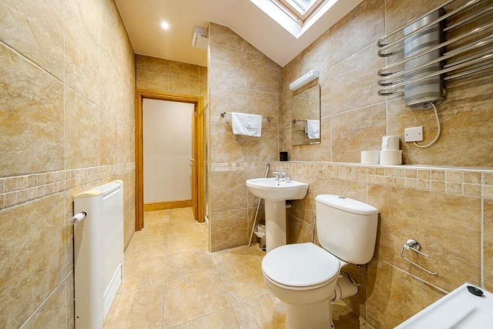 Family Room, Patio, Garden View | Bathroom | Separate tub and shower, deep soaking tub, rainfall showerhead